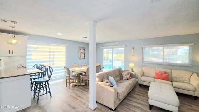 8 Tarpon Ave, Ormond Beach, FL 32176 - living room featuring wood finished floors