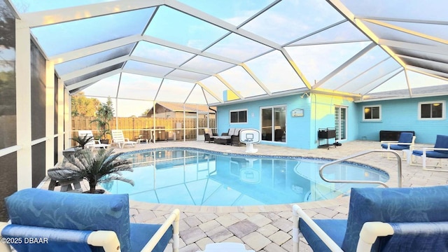 8 Tarpon Ave, Ormond Beach, FL 32176 - view of swimming pool with a patio, glass enclosure, and fence