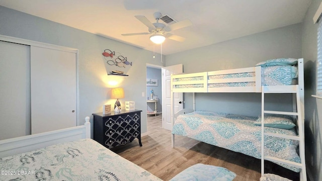 8 Tarpon Ave, Ormond Beach, FL 32176 - bedroom featuring wood finished floors and a ceiling fan