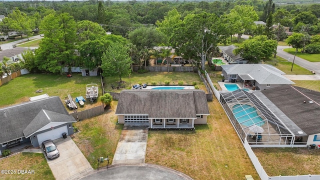 drone / aerial view of a pool