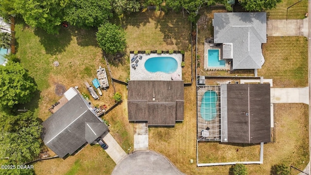 drone / aerial view of a pool