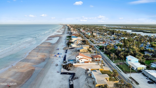 bird's eye view with a view of the beach and a water view