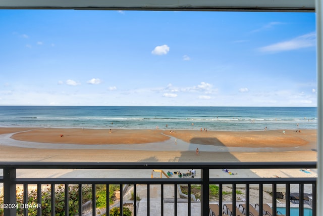 view of water feature with a beach view