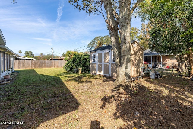 view of yard with a storage shed