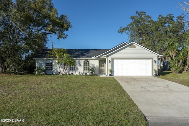 ranch-style home featuring a garage and a front lawn