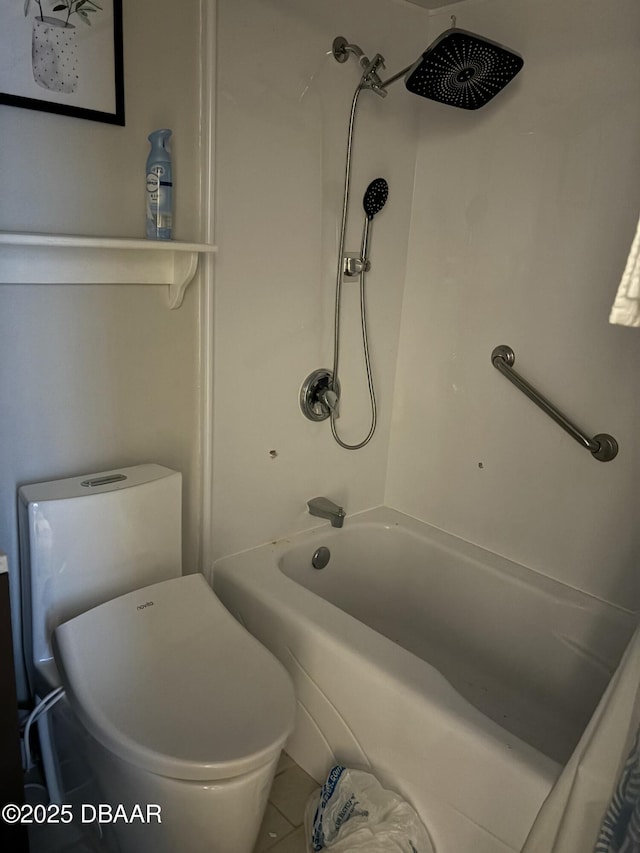 bathroom featuring toilet and washtub / shower combination