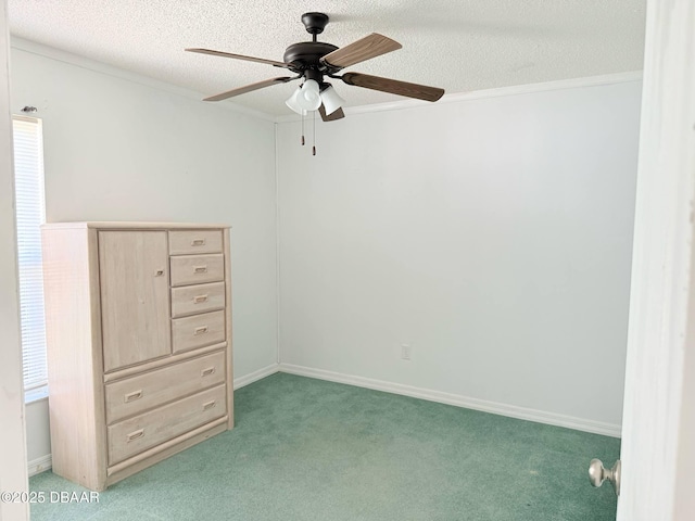 3531 Red Barn Ln, Ormond Beach, FL 32174 - unfurnished bedroom with light colored carpet, crown molding, a textured ceiling, and a ceiling fan
