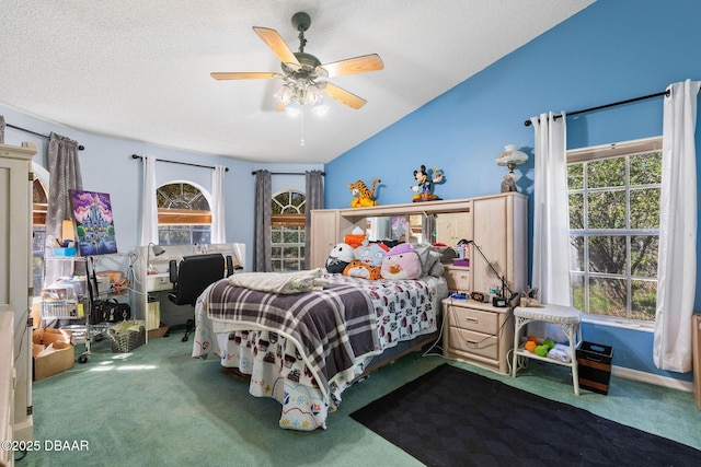 bedroom with lofted ceiling, carpet, a ceiling fan, and a textured ceiling