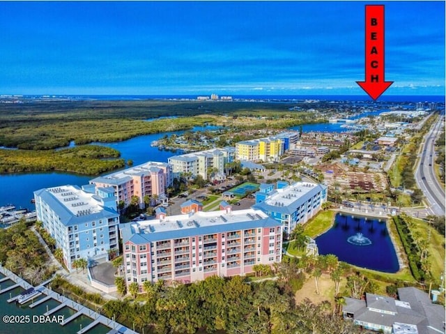 birds eye view of property featuring a water view