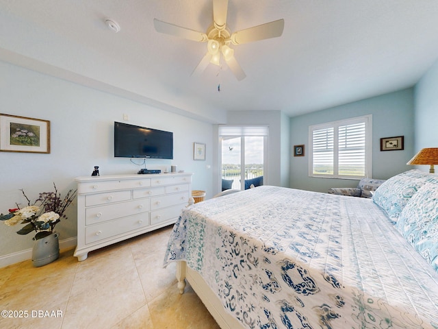 bedroom with light tile patterned floors and ceiling fan