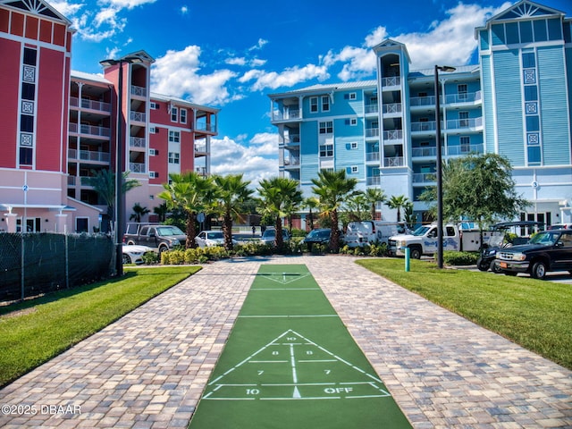 view of community featuring a lawn