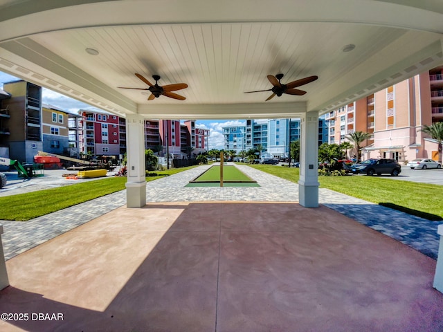 view of patio / terrace featuring ceiling fan