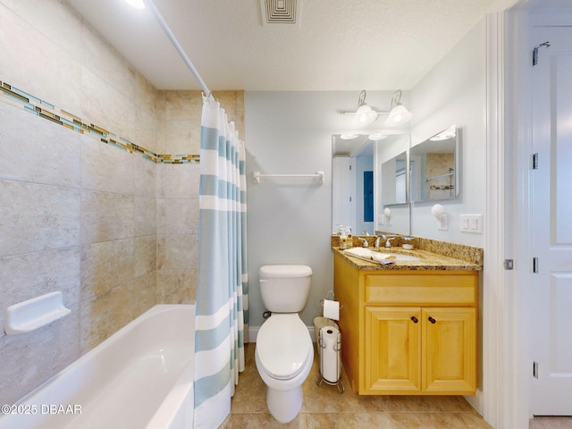 full bathroom with shower / bath combo, vanity, tile patterned flooring, toilet, and a textured ceiling