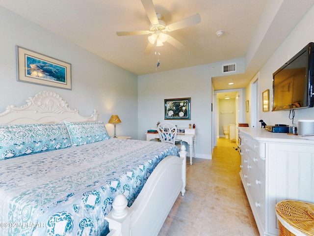 tiled bedroom featuring ceiling fan