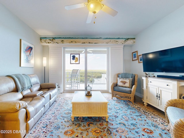 living room featuring ceiling fan