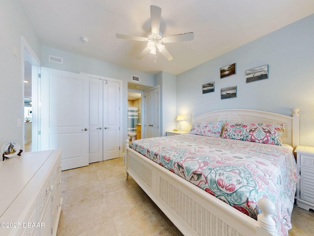 bedroom featuring connected bathroom, ceiling fan, and a closet