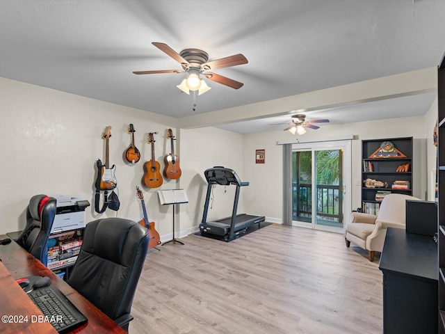 office area with light hardwood / wood-style flooring and ceiling fan