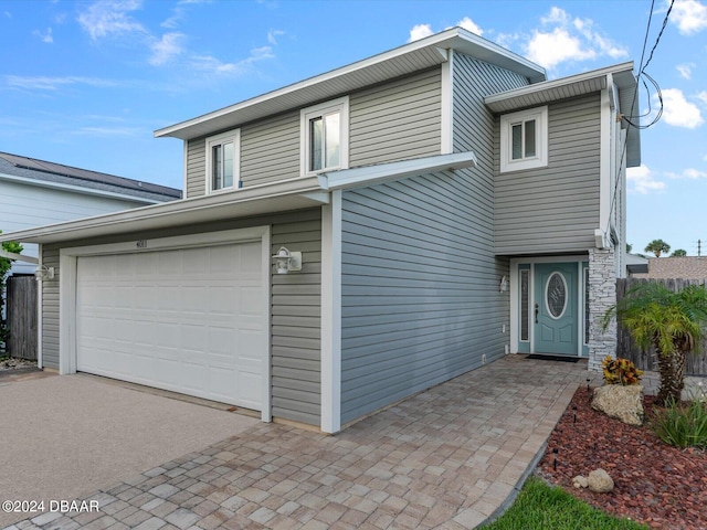 view of front property with a garage