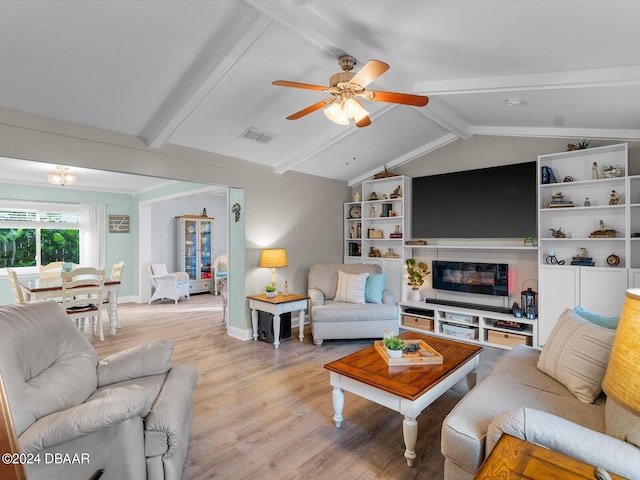 living room with ceiling fan, light wood-type flooring, and lofted ceiling with beams