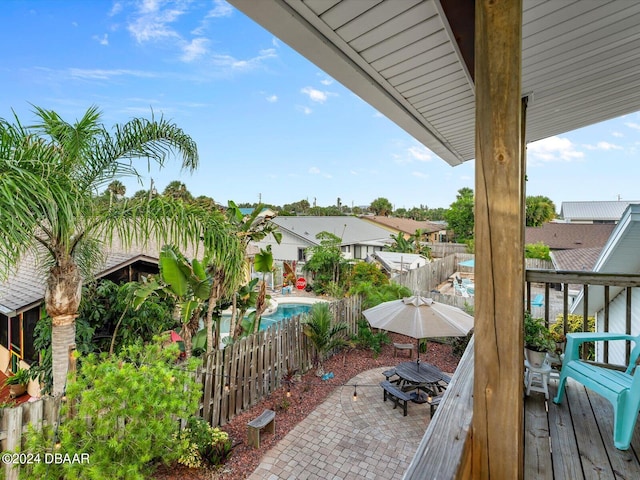 exterior space with a fenced in pool