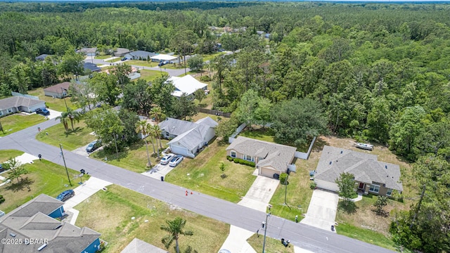 5 Zammer Ct, Palm Coast, FL 32164 - birds eye view of property with a residential view and a wooded view