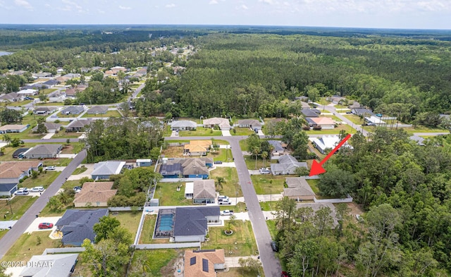5 Zammer Ct, Palm Coast, FL 32164 - drone / aerial view featuring a residential view and a wooded view