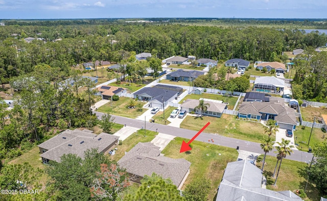 5 Zammer Ct, Palm Coast, FL 32164 - bird's eye view featuring a wooded view and a residential view