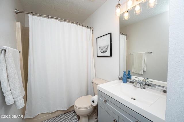5 Zammer Ct, Palm Coast, FL 32164 - bathroom with vanity, a shower with curtain, toilet, and a textured ceiling