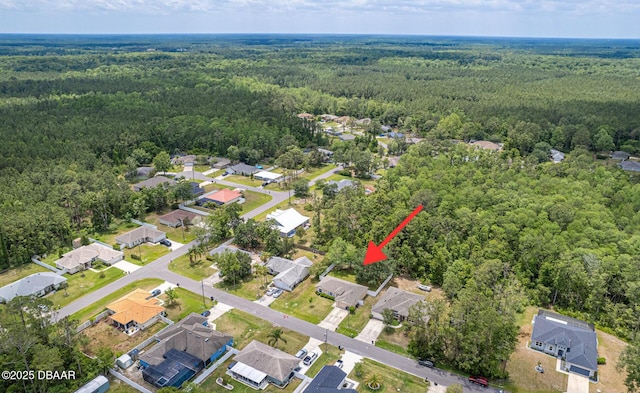 5 Zammer Ct, Palm Coast, FL 32164 - drone / aerial view with a residential view and a forest view