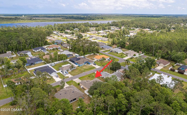 5 Zammer Ct, Palm Coast, FL 32164 - drone / aerial view featuring a water view, a residential view, and a wooded view