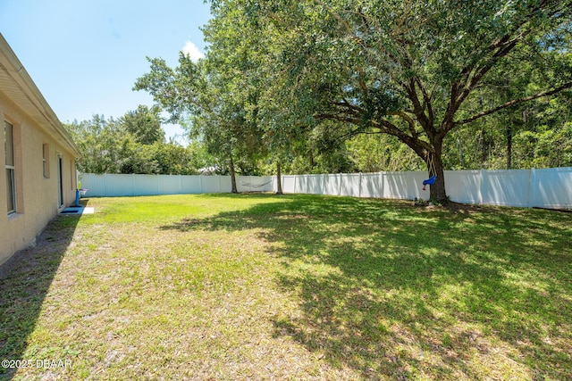 5 Zammer Ct, Palm Coast, FL 32164 - view of yard with a fenced backyard