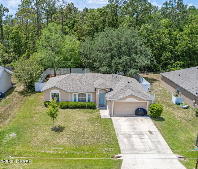 5 Zammer Ct, Palm Coast, FL 32164 - single story home featuring fence, stucco siding, an attached garage, and driveway