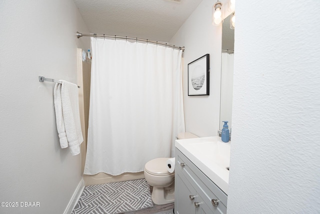 5 Zammer Ct, Palm Coast, FL 32164 - full bathroom with vanity, a textured ceiling, and toilet