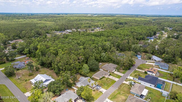 5 Zammer Ct, Palm Coast, FL 32164 - aerial view with a residential view and a forest view