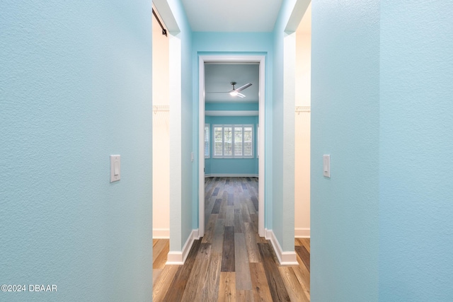 300 Blue Starfish Pl, Daytona Beach, FL 32124 - hall with baseboards, a textured wall, and wood finished floors