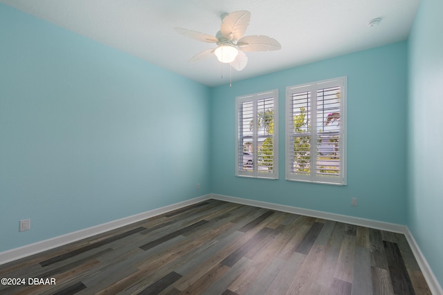 300 Blue Starfish Pl, Daytona Beach, FL 32124 - unfurnished room with dark wood-style floors, baseboards, ceiling fan, and a smoke detector