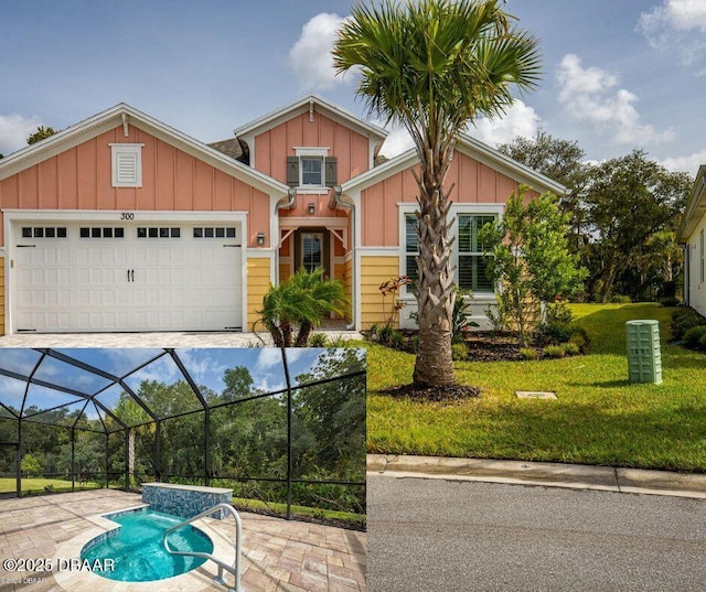 300 Blue Starfish Pl, Daytona Beach, FL 32124 - view of front of property featuring board and batten siding, a front lawn, an attached garage, and a lanai