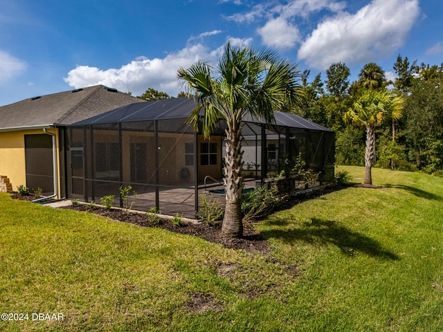 300 Blue Starfish Pl, Daytona Beach, FL 32124 - rear view of property featuring stucco siding, a lawn, a patio, and an outdoor pool