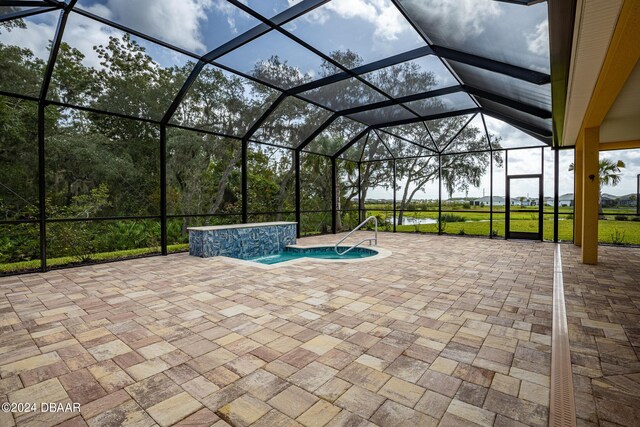 300 Blue Starfish Pl, Daytona Beach, FL 32124 - outdoor pool featuring a patio area, a water view, and a lanai