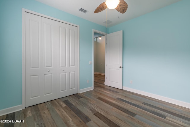 300 Blue Starfish Pl, Daytona Beach, FL 32124 - unfurnished bedroom featuring a closet, wood finished floors, baseboards, and ceiling fan
