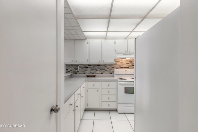 kitchen featuring tasteful backsplash, white cabinetry, electric stove, light tile patterned floors, and a drop ceiling