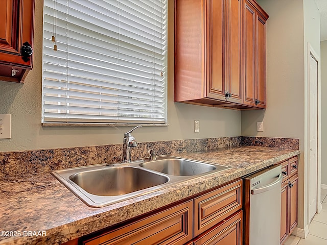 189 Perfect Dr, Daytona Beach, FL 32124 - kitchen with stainless steel dishwasher, plenty of natural light, and dark countertops