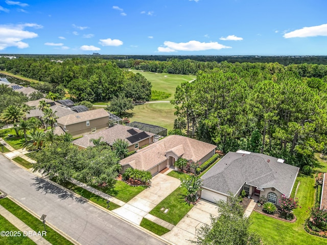 189 Perfect Dr, Daytona Beach, FL 32124 - aerial view of a golf club and a heavily wooded area