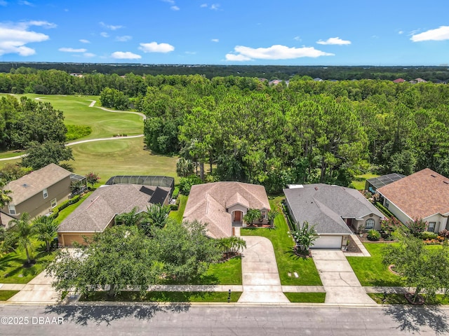 189 Perfect Dr, Daytona Beach, FL 32124 - aerial perspective of suburban area featuring a golf course and a heavily wooded area