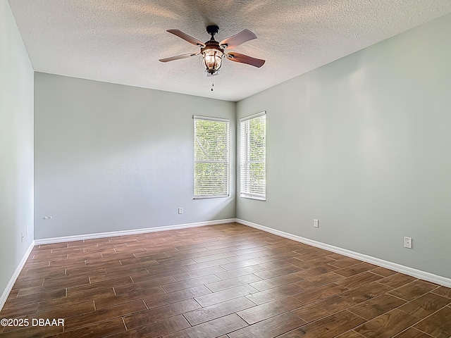 189 Perfect Dr, Daytona Beach, FL 32124 - unfurnished room featuring wood tiled floors, a ceiling fan, and a textured ceiling