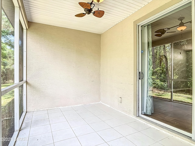 189 Perfect Dr, Daytona Beach, FL 32124 - unfurnished sunroom featuring a ceiling fan