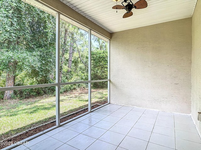 189 Perfect Dr, Daytona Beach, FL 32124 - unfurnished sunroom featuring a ceiling fan and healthy amount of natural light