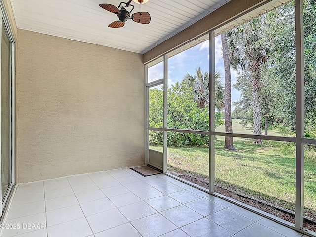 189 Perfect Dr, Daytona Beach, FL 32124 - unfurnished sunroom featuring a ceiling fan