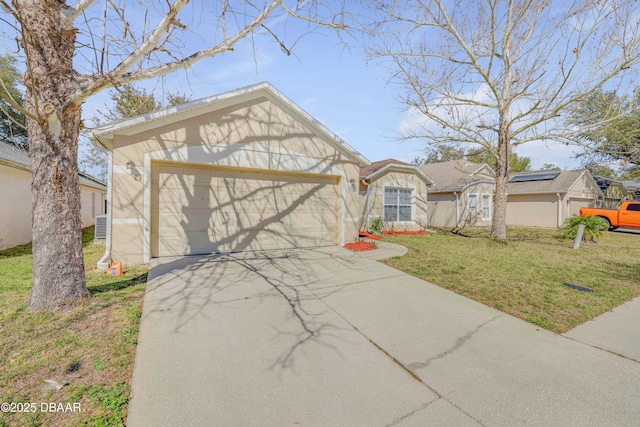 view of front of house featuring a garage, driveway, a front yard, and stucco siding