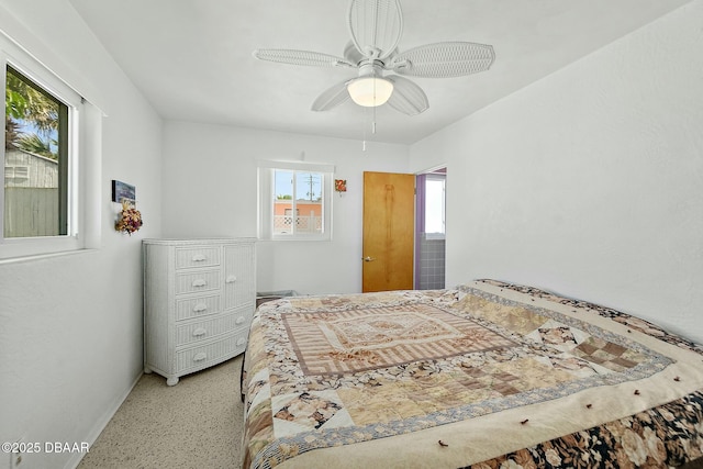 bedroom with baseboards and ceiling fan